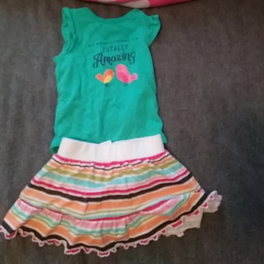 Cute baby onsie and striped skirt size 3 months